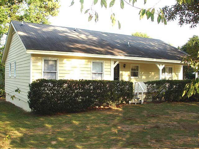 Darling cottage on large lot in a quiet neighborhood.