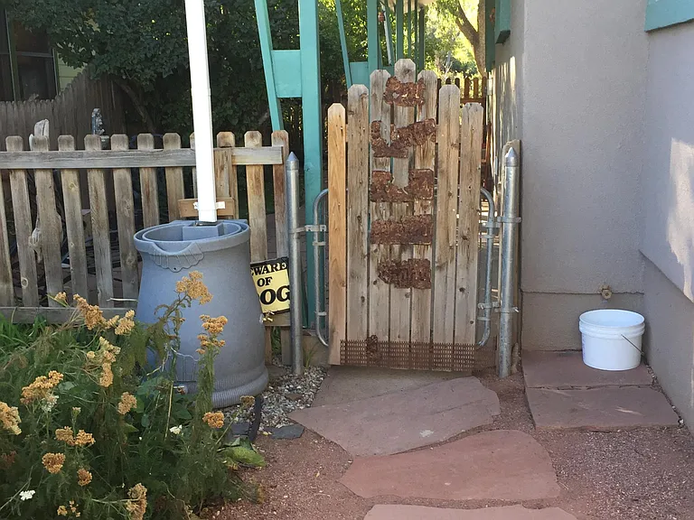 Entry to side patio; has seating area outside Bonus room sliding door