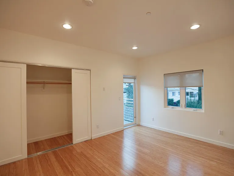 Rear Bedroom Closet & Balcony Door