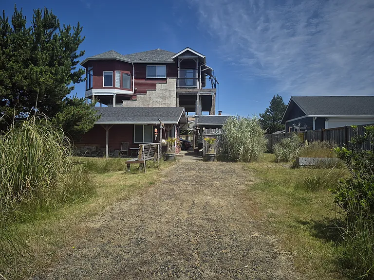View from side street, this shows a parking area and the studio is in the shorter building.