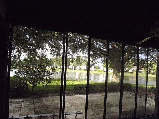 screened porch with pond view