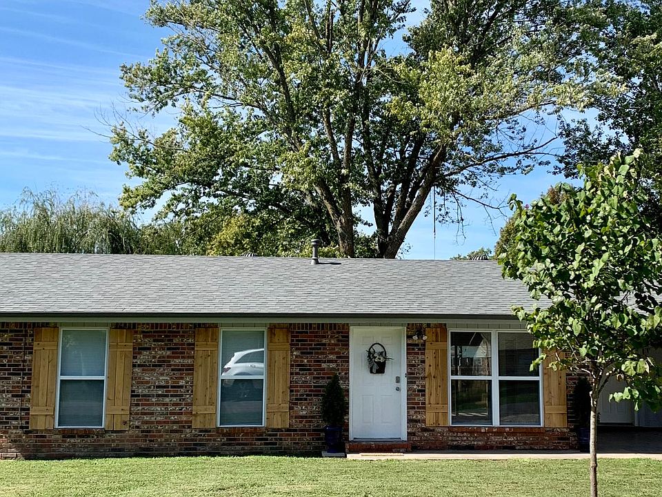 Front yard, carport