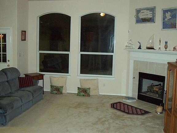 Oversized windows, Gas burning fireplace with log set, woode
