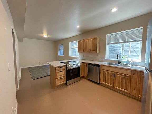 Large kitchen overlooking living room