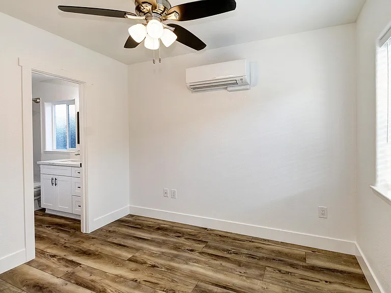bedroom, shows access to bathroom