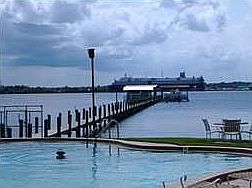 VIEW OF SHIP BEYOND DOCK