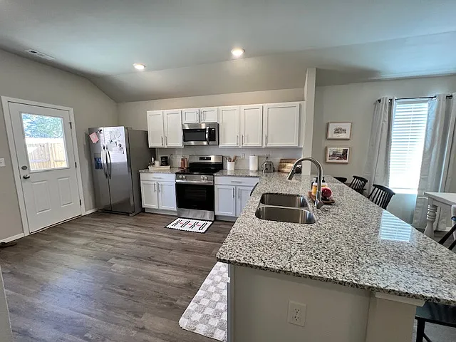 You'll love entertaining using this granite countertop breakfast bar!