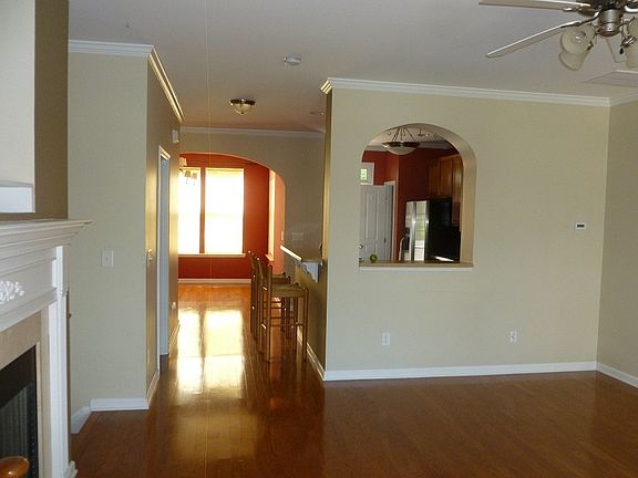 Livingroom to Dining room with Counter and Bar Stools