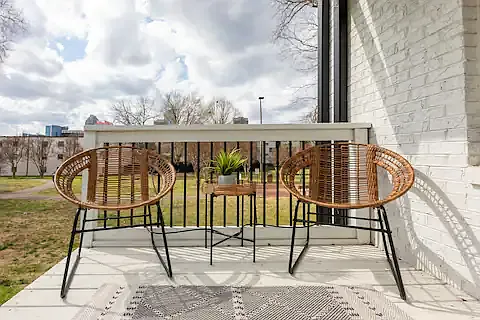 Front entry deck overlooks the park.