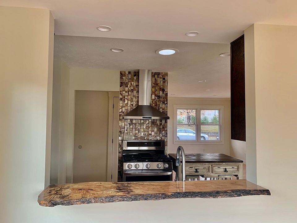 Kitchen with opening to dining area
