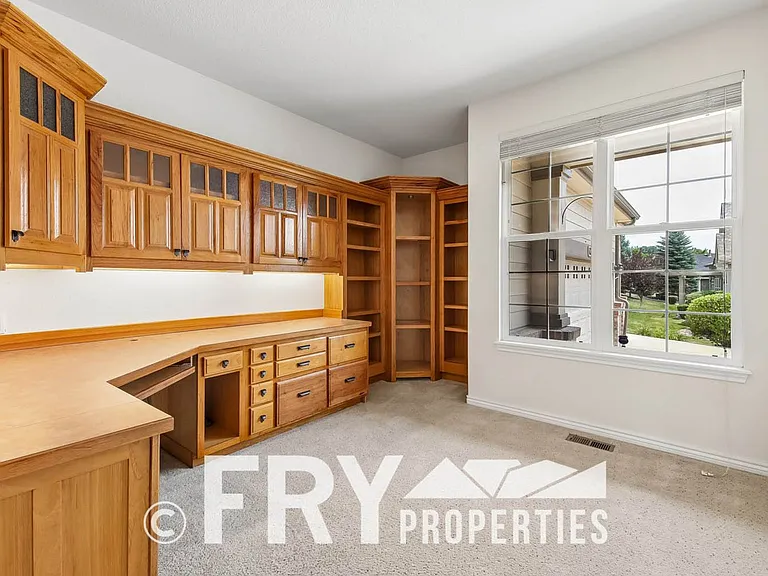 12975 W 77th Dr — Photo 8