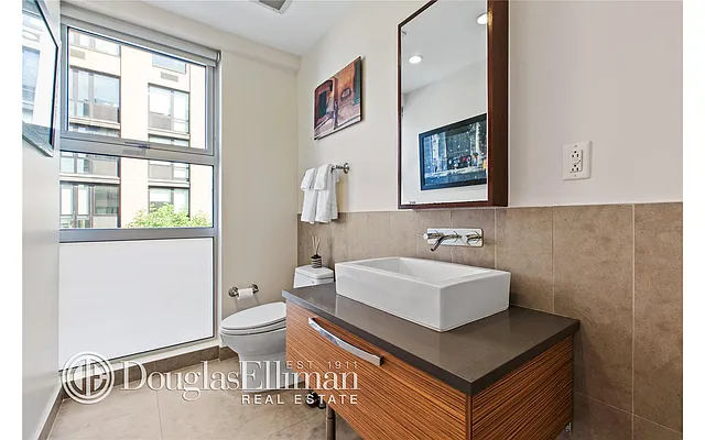 Sold by Douglas Elliman | media 9