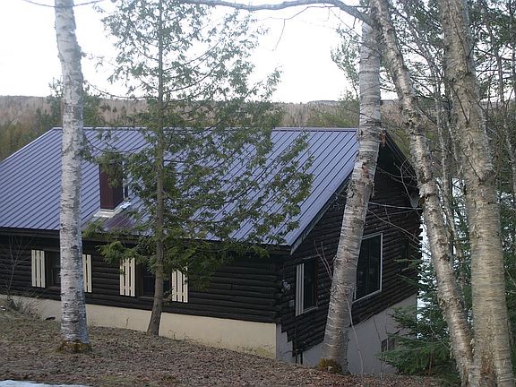 Back side by driveway