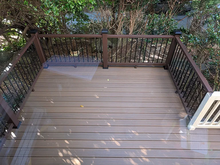 Newly remodeled front stairs and front deck. Proving ample entertaining with a front porch and a front deck!