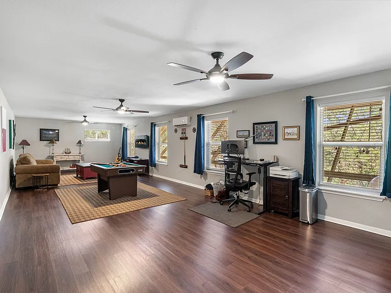 Basement / Game Room / queen sleeper sofa / fire place + more!