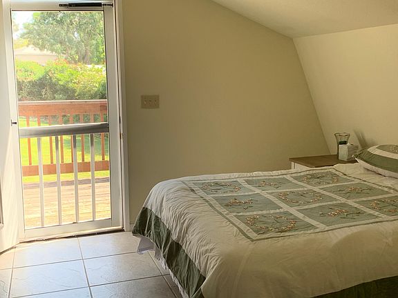 Bedroom open to front deck.