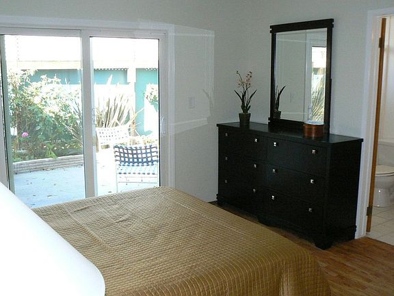 Master Bedroom looking out to private landscaped patio