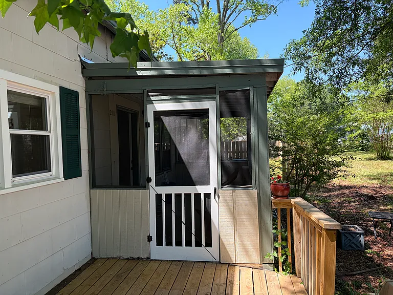Enter through the screened porch.