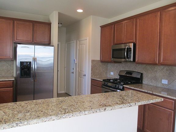 Breakfast bar opens up to dining area.