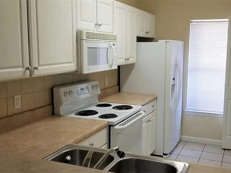 4950 NW 44th Ln #103 — Photo 12