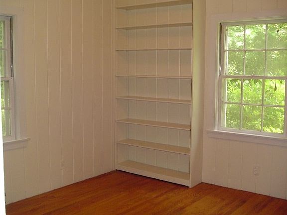 bedroom with built in bookcase