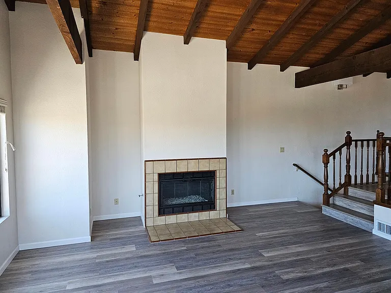 Living room gas fireplace with glass crystals.