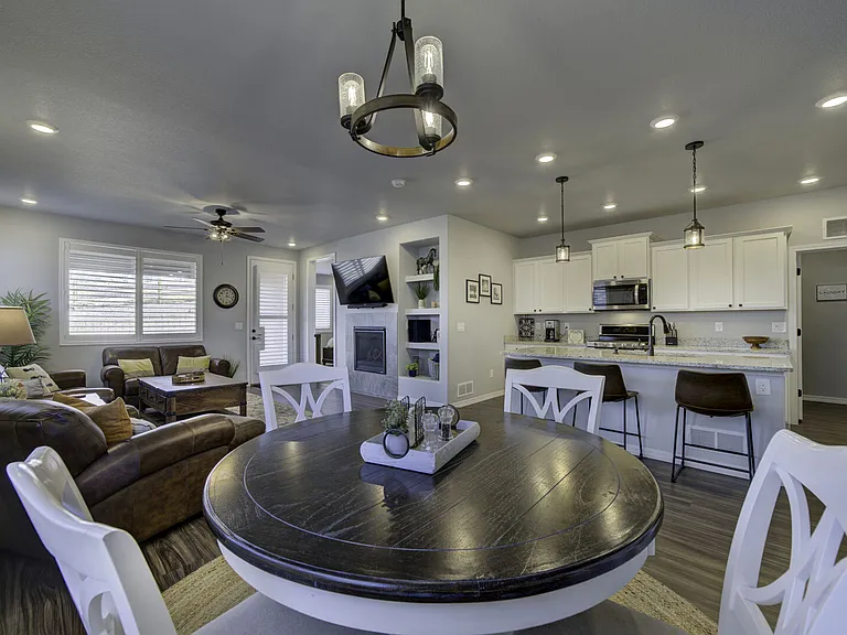 Dining
Plenty of seating between the dining and kitchen island. With additional seating for games in the basement!