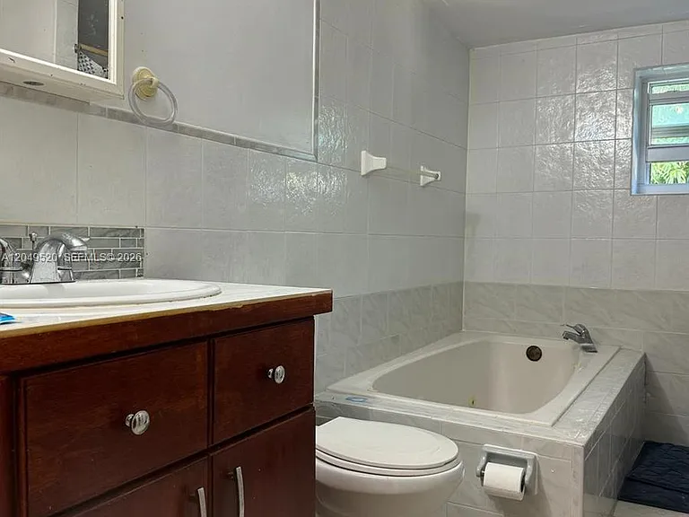 225 NE 175th Ter #A — Photo 16