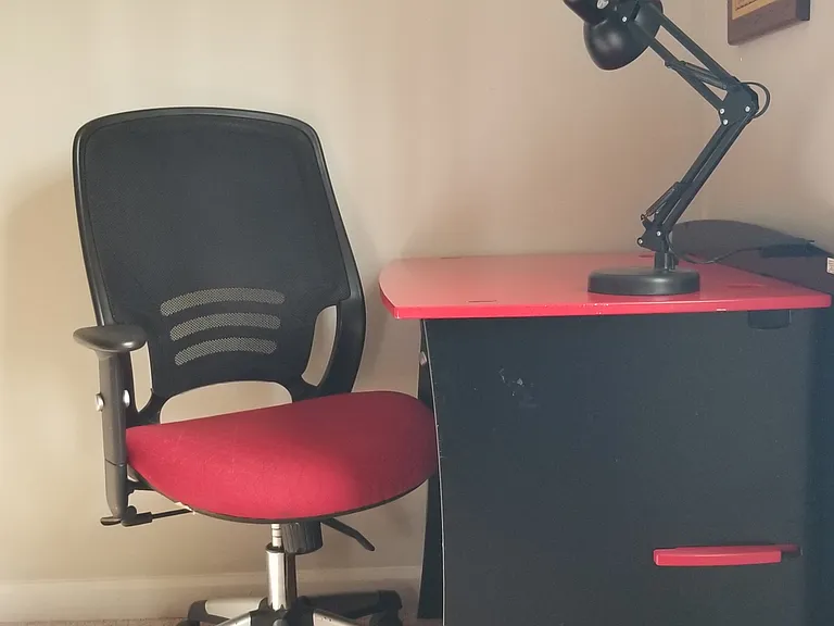 Desk and an ergonomic chair for your dedicated work area in the third bedroom.