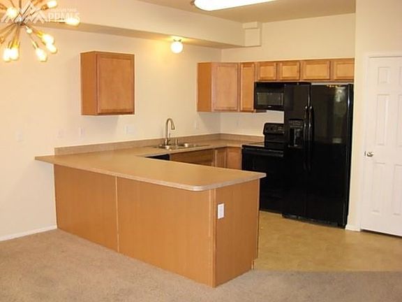 spacious, light filled entry with hallway bath and garage access