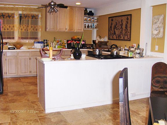 Kitchen opens to dining area