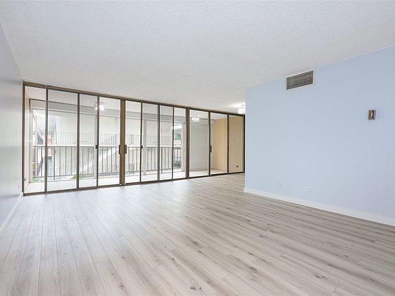 Bright living area that leads out to the covered lanai.