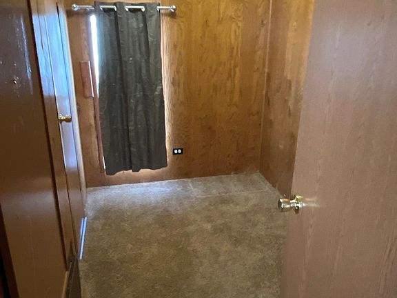 One of two adjoined bedrooms, which are attached by the .5 bathroom