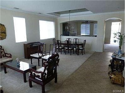 LARGE FORMAL LIVINGROOM AND DININGROOM AS YOU ENTER THE FRONT DO