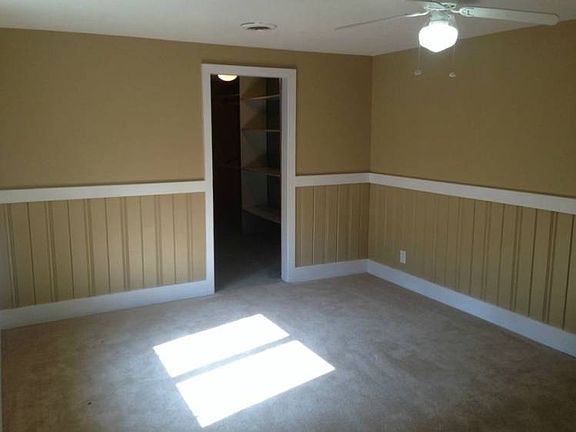 One of the bedrooms with a huge walk-in closet