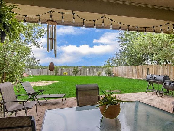 Check out the amazing covered back patio for outside entertainment with NO BACK NEIGHBORS!