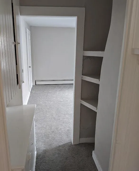 Storage shelves and cabinets in hall