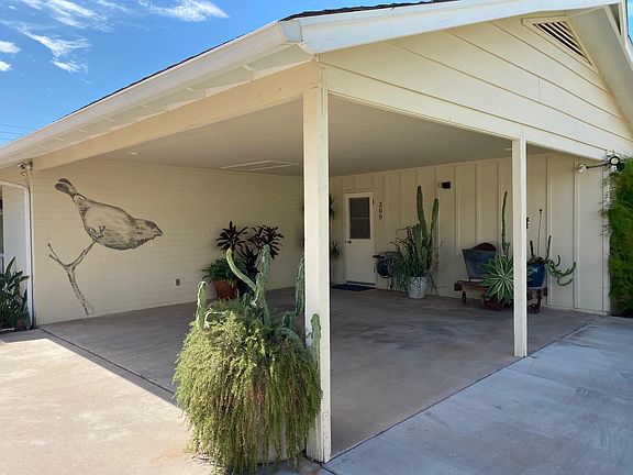 2 car carport, and pad for extra car