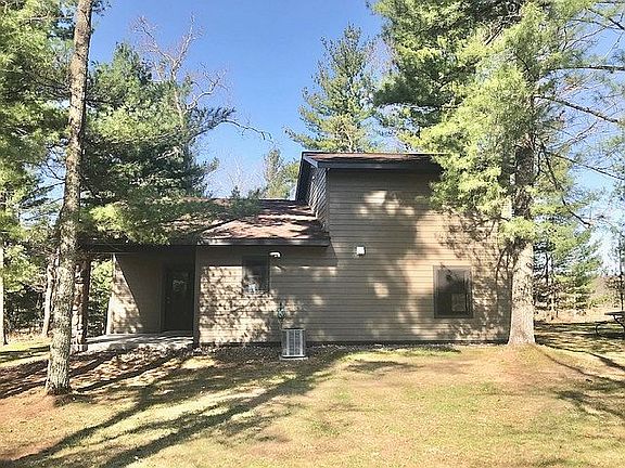 Rear with covered porch 