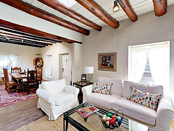 There's seating for 5 in the home's main living room.