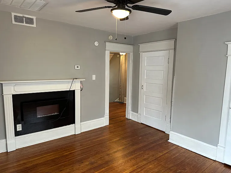 Living Room w/ Newly Beautiful Refinished Hardwood Floors!