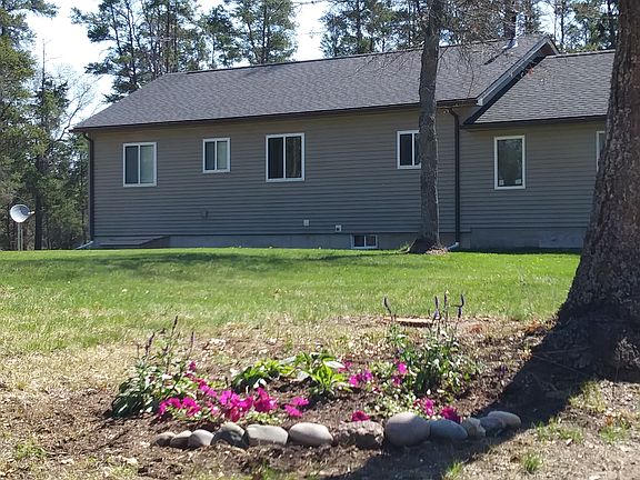 Back of home faces road.