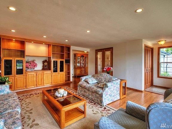 View 2 Of Living. Entry Door Is Right Of The Window. Double French Doors Go To The Dining Room.