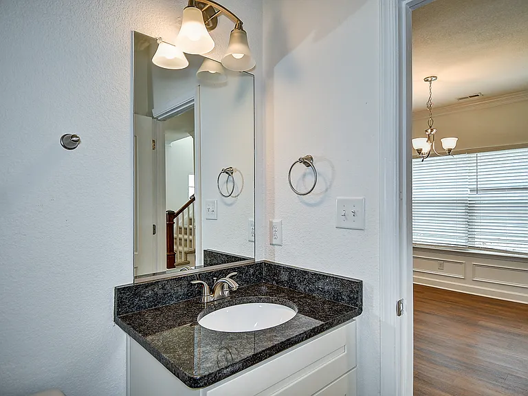 Full bath on first floor connected to first floor bathroom.