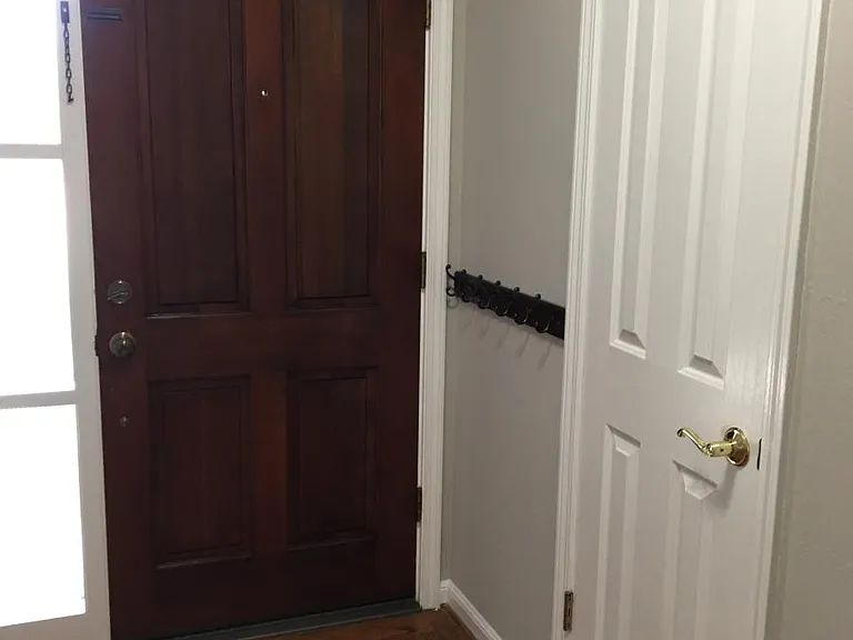 Front door and front hall closet.