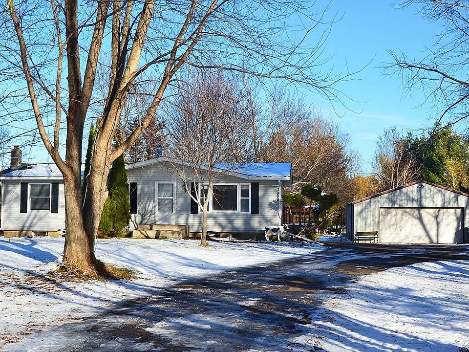 Front yard and out building