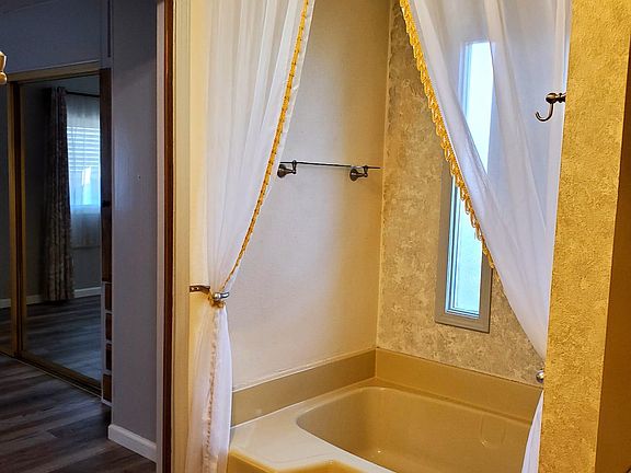 Master bathroom with oversized bathtub