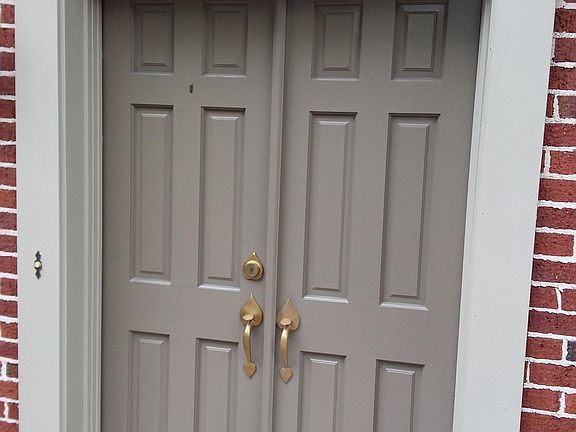 Unit C Front Door-wood double doors