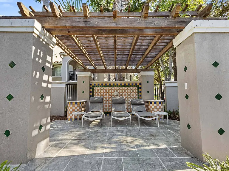 Enjoy the comfort of poolside cabanas, offering a shaded retreat for relaxation and convenience.