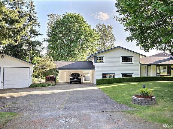 Fully remodeled House with Master suite on upper level. 2+ garage and carport with more storage behind and a storage shed in back yard along with a covered 40' RV/Boat storage